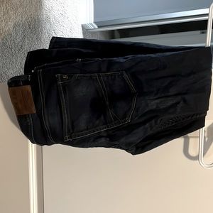 Men’s tapered faded jeans